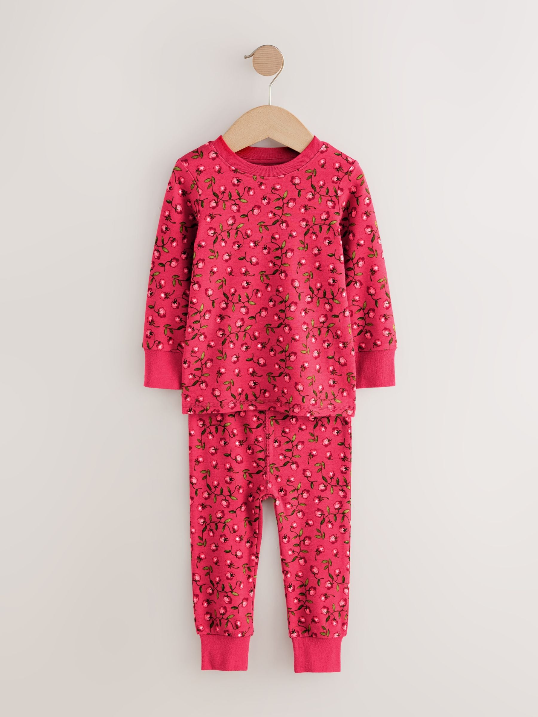 Rood/roze bloemenapplicatie - Verpakking van 3 knusse pyjama's (9 mnd-9 jr)