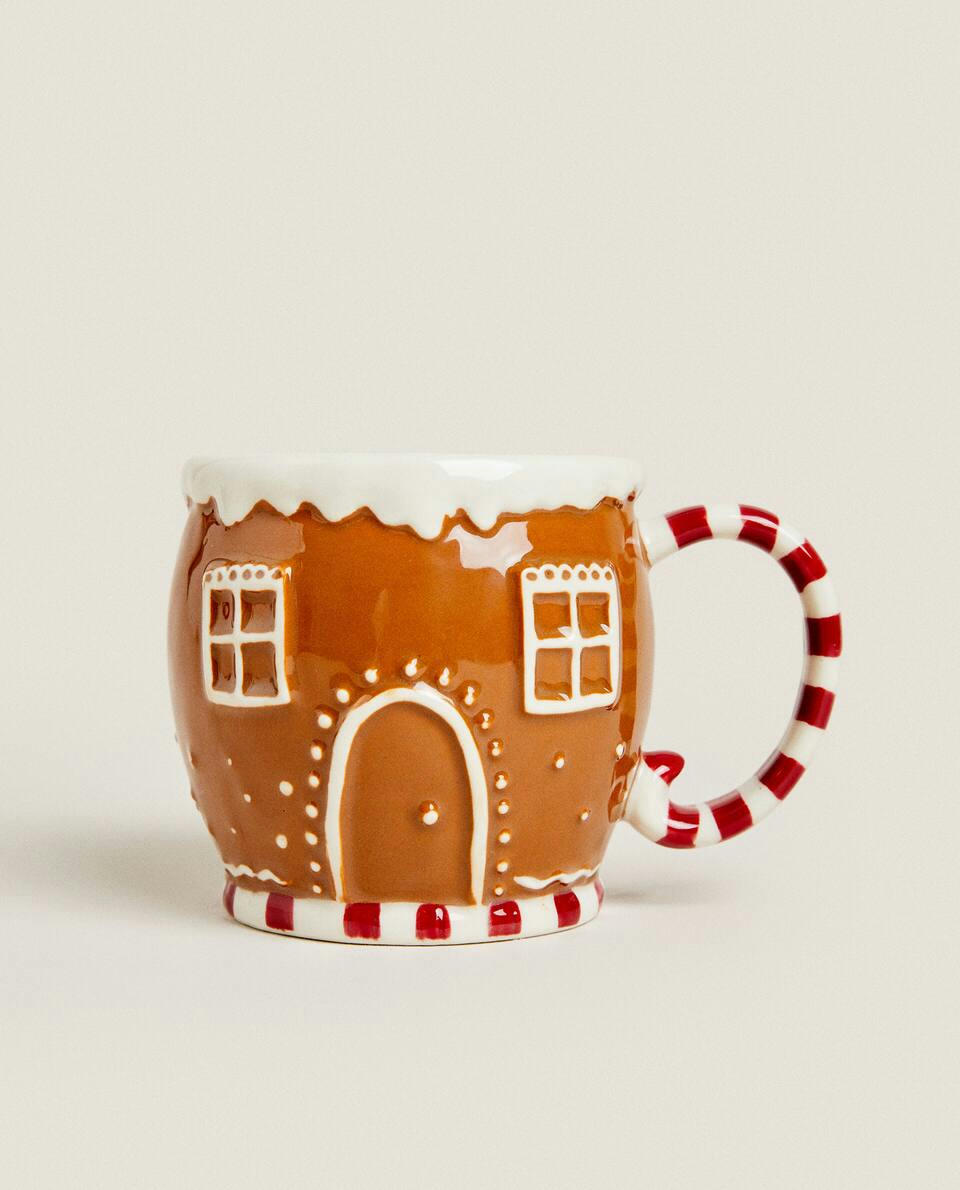 CANECA INFANTIL DE CERÂMICA EM FORMATO DE CASA DE NATAL