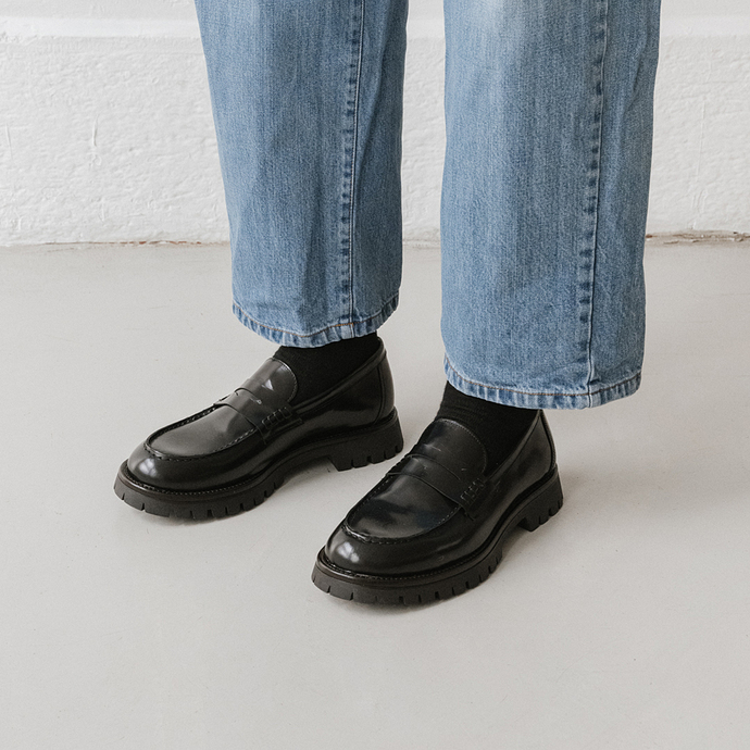 Mocassins à semelles crantées  en cuir glacé noir