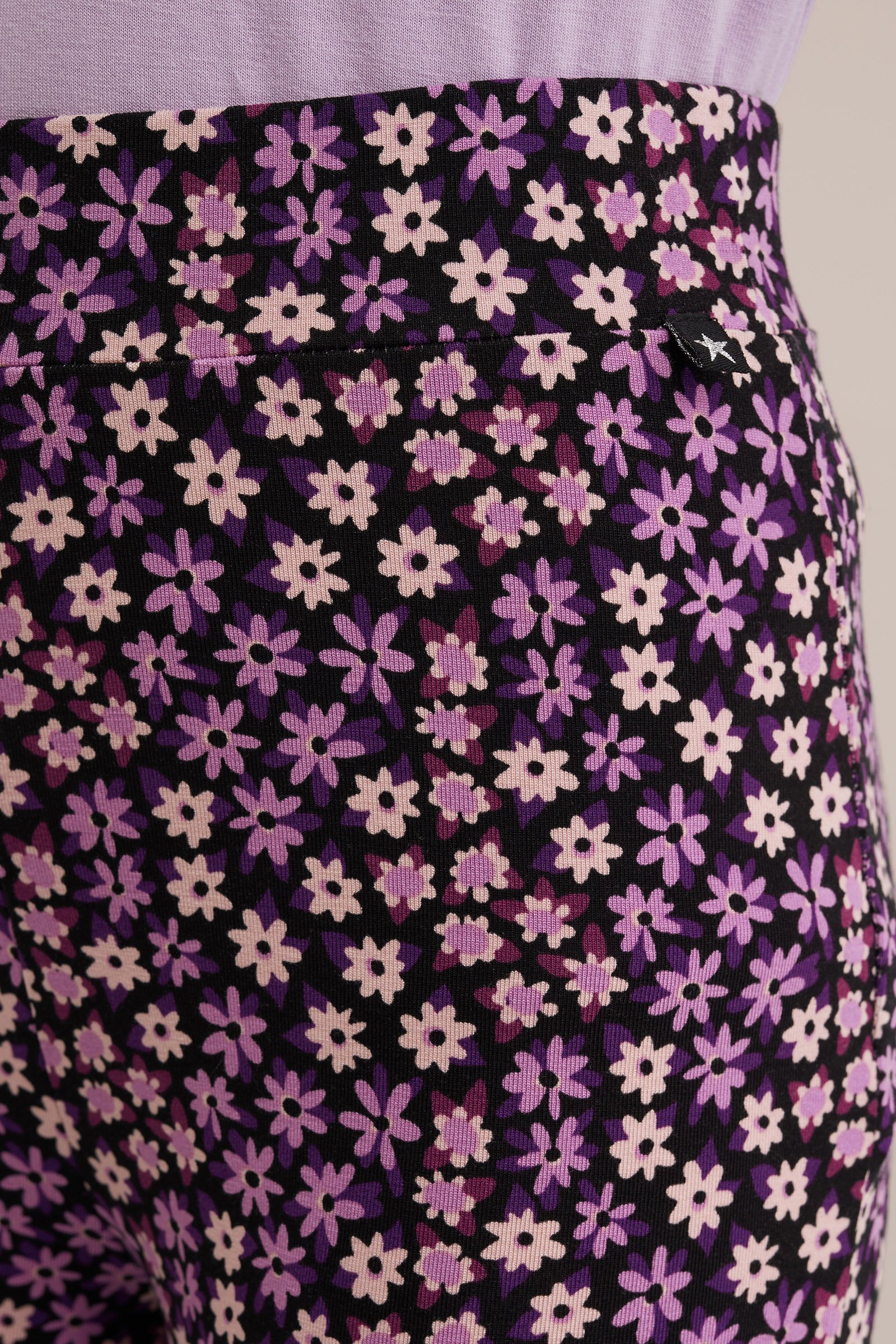 Meisjes flared legging met dessin WE Fashion Paars