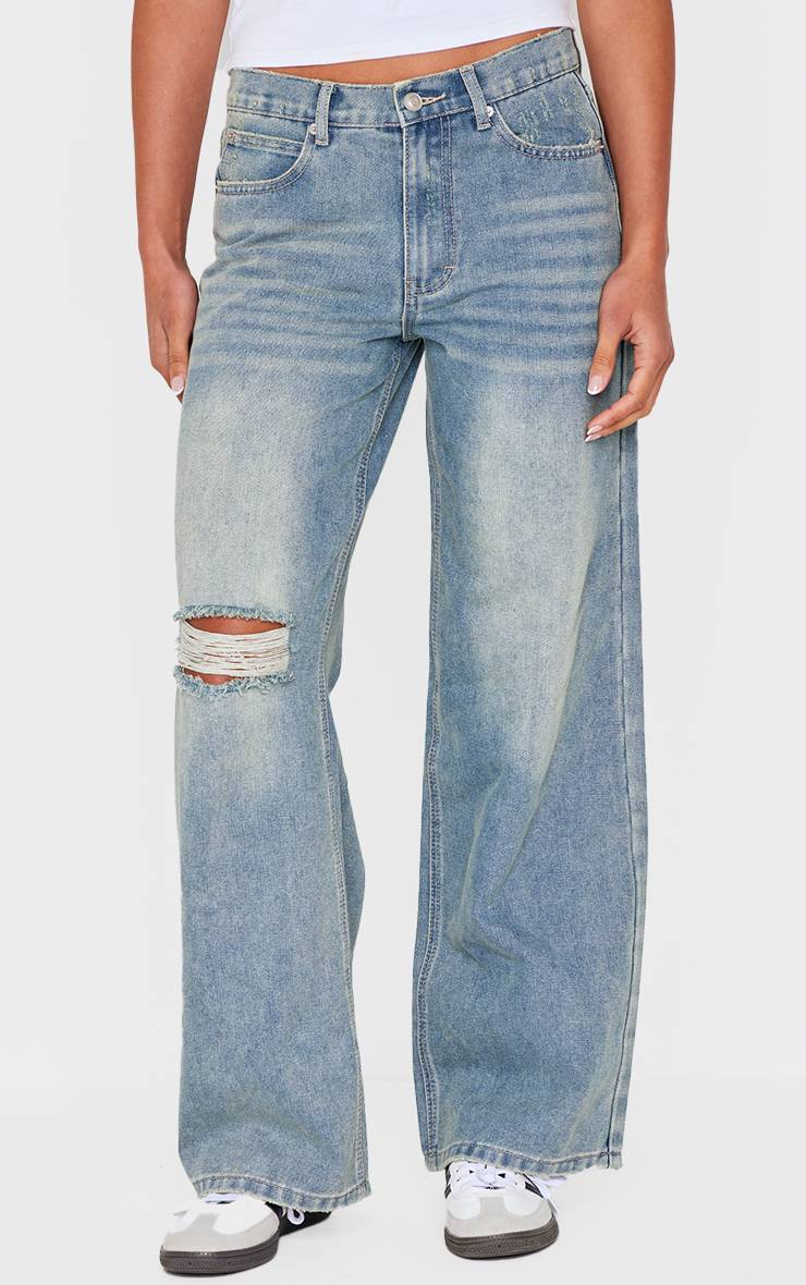 Délavage Vintage Jean Boyfriend Vintage Déchiré Aux Genoux Ourlet Effiloché
