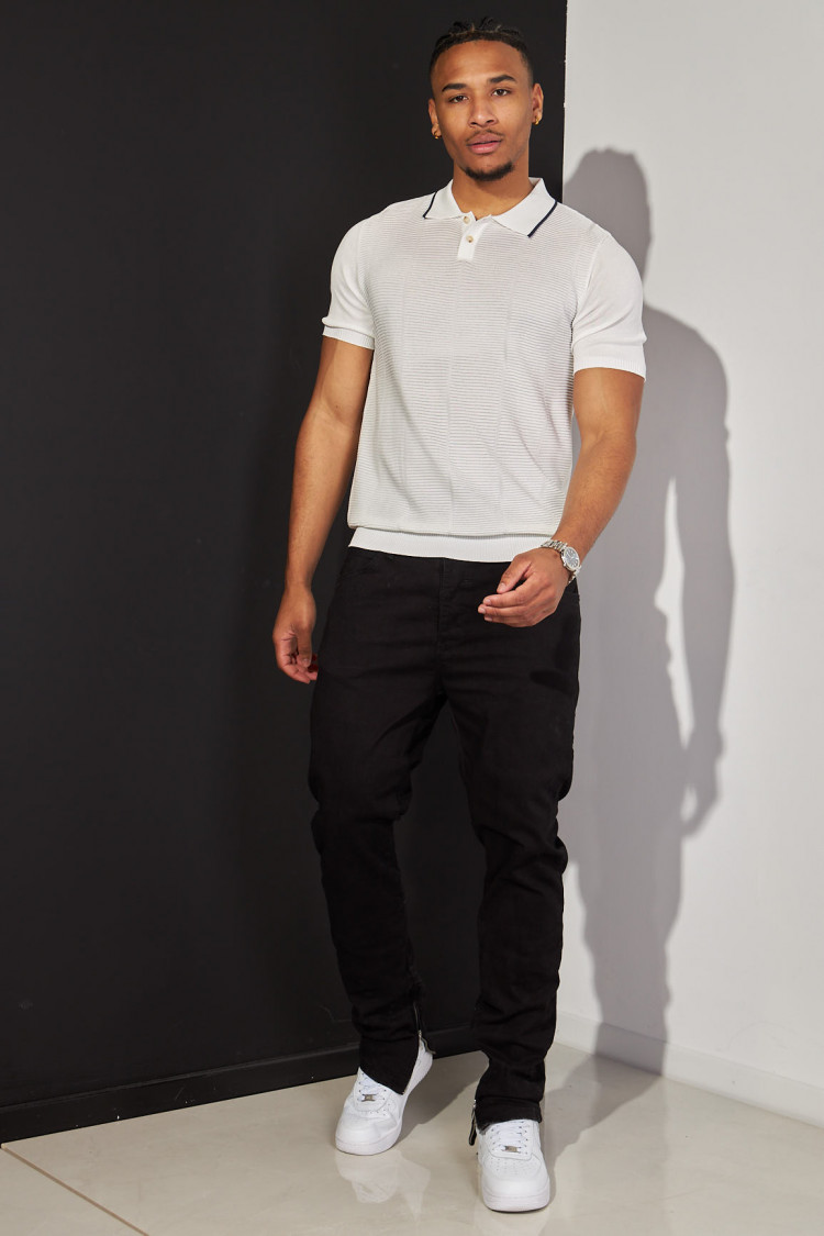 Polo blanc plissé avec détail noir