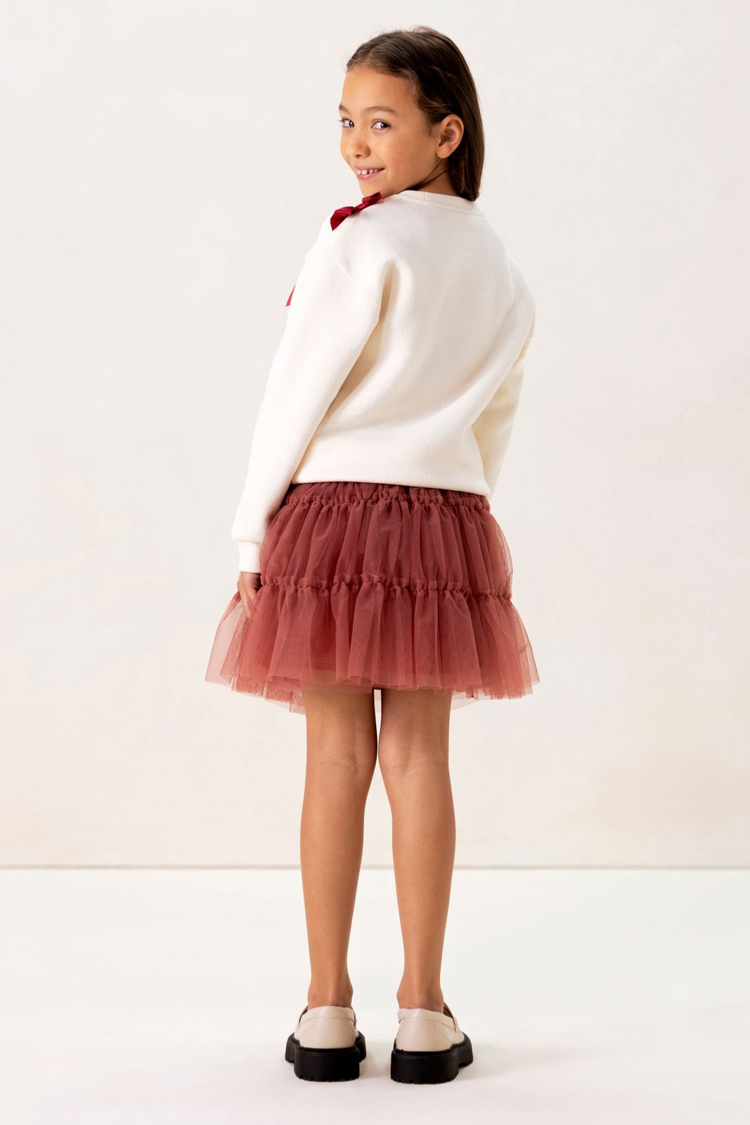 Witte sweater met strikjes