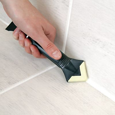 Extracteur et lisseur de joint Smartool sur ciment