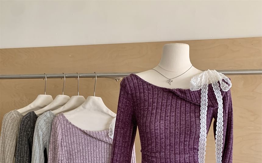 Dute - Asymmetrisch gebreide top met lange mouwen en boothals