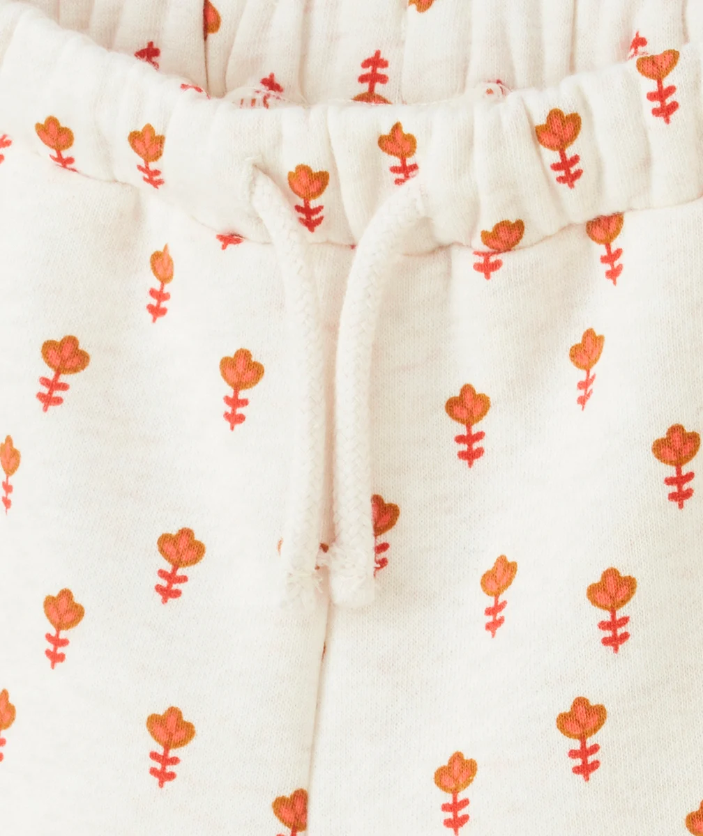 JOGGING BÉBÉ FILLE EN FIBRES RECYCLÉES ÉCRU CHINÉ IMPRIMÉ FLEURI ORANGE