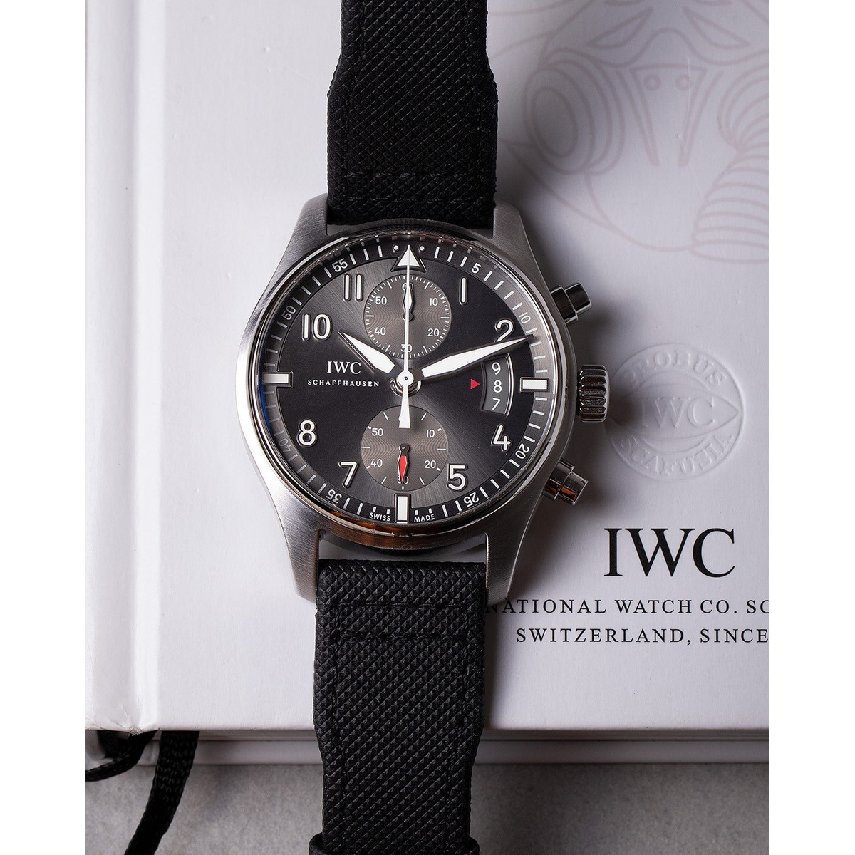 Montre d'occasion IWC Spitfire homme automatique acier bracelet textile noir
