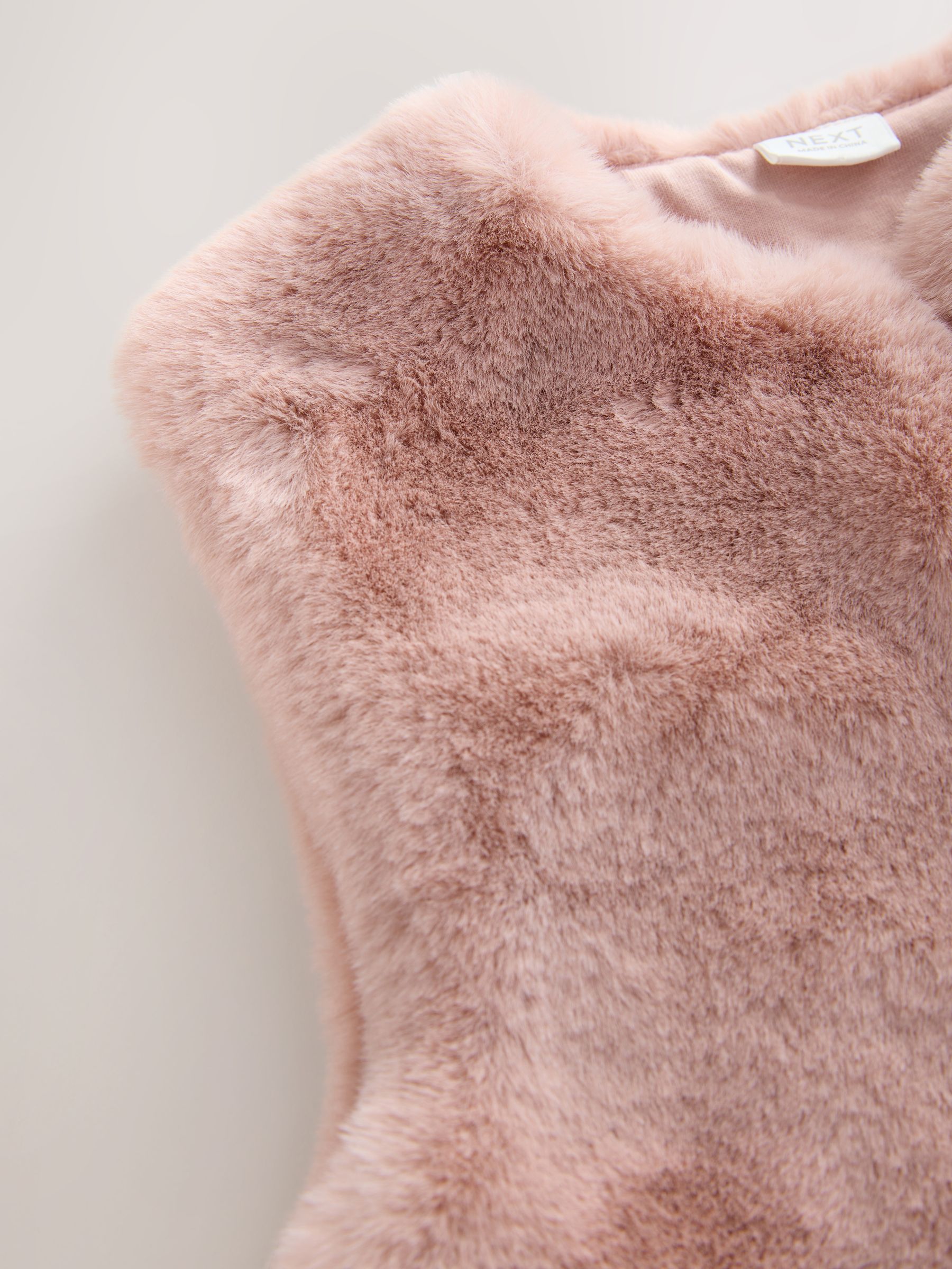 Roze - Bodywarmer van imitatiebont (3mnd -7jr)