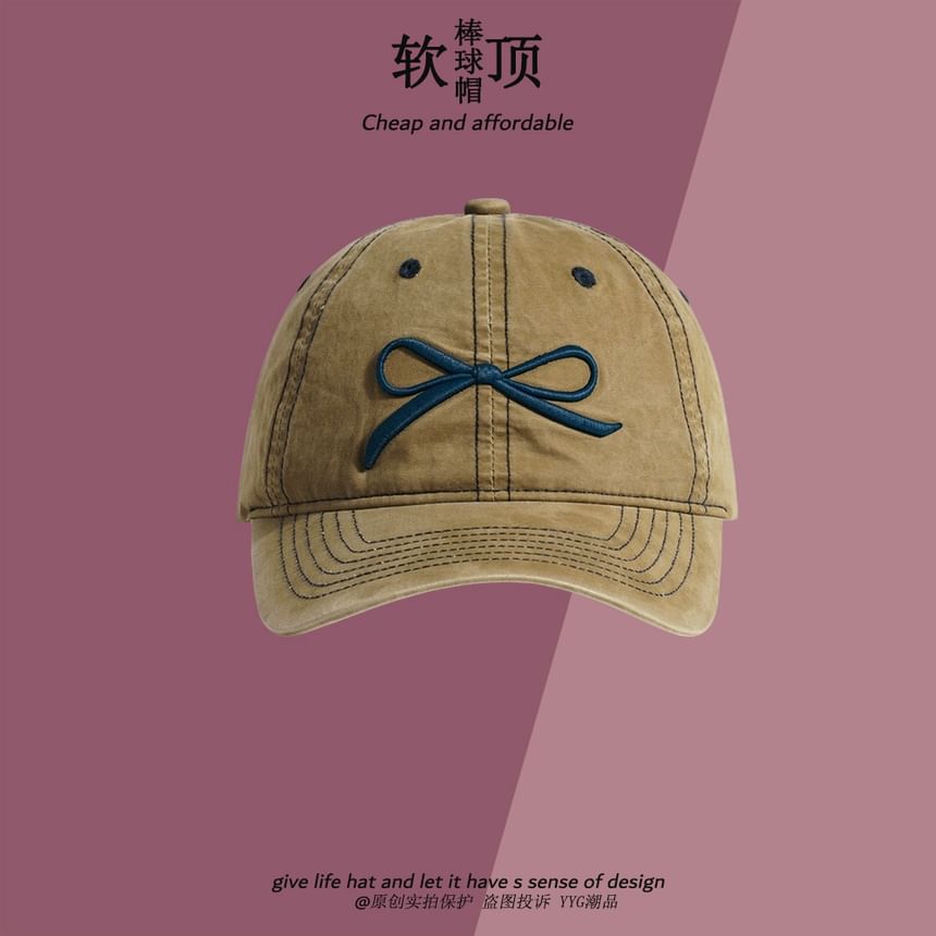 Alpha Kiss - Baseballpet met strikborduursel en contraststiksel