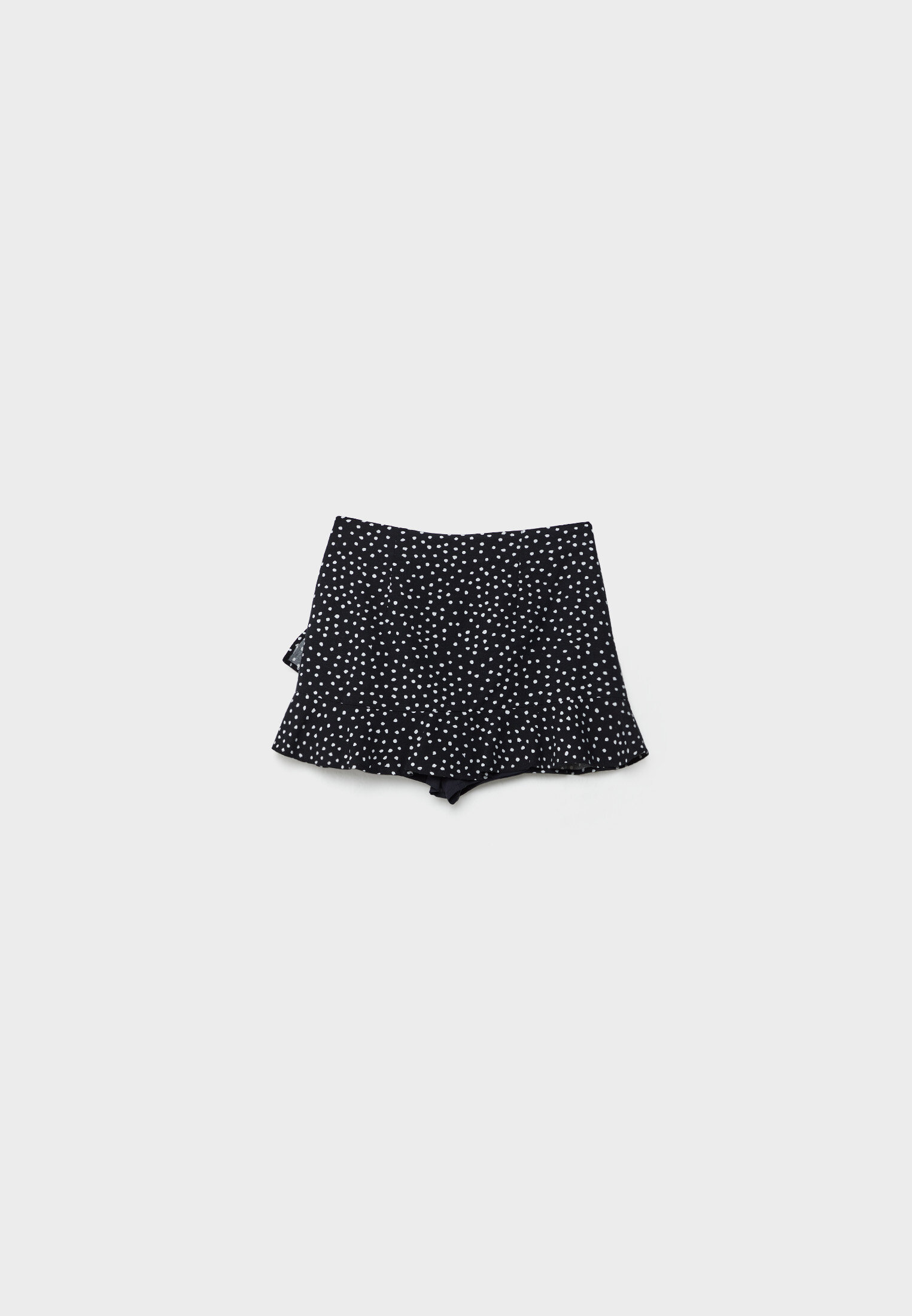Shorts estampados em mistura de linho com babados.