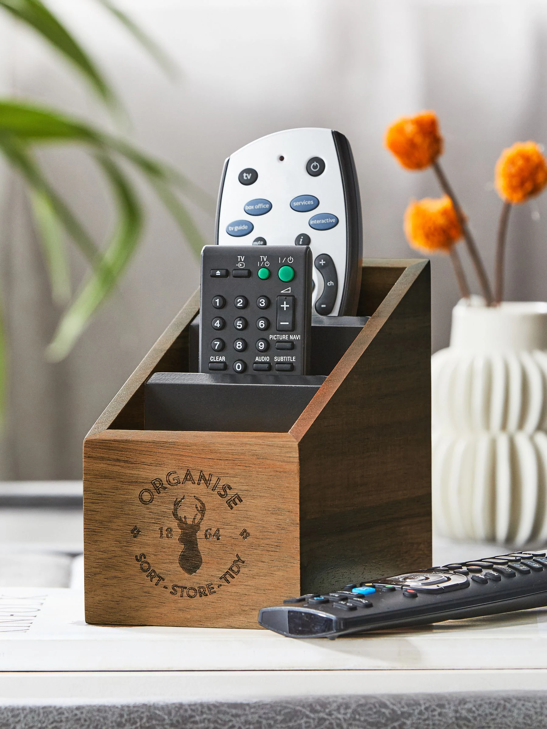 Houder voor tv-afstandsbedining
