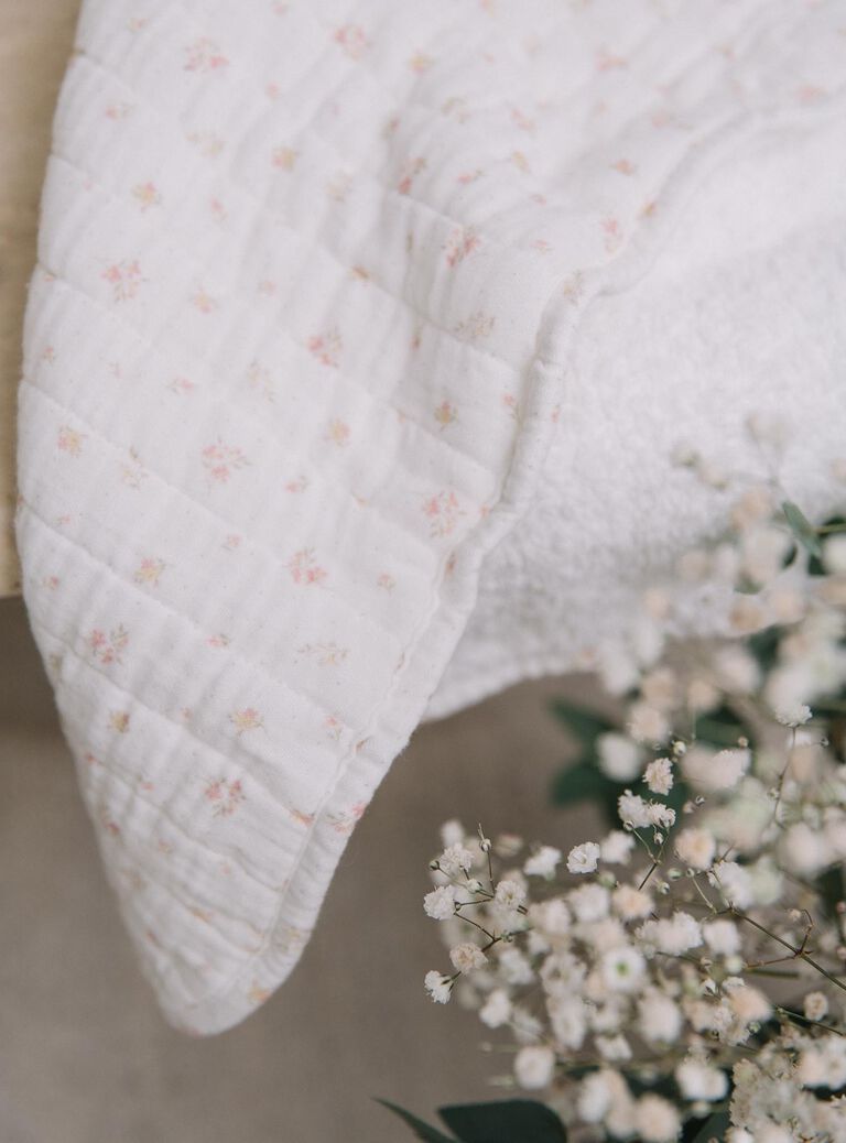 Matelas à langer de voyage vanille pliable et à imprimé fleuri