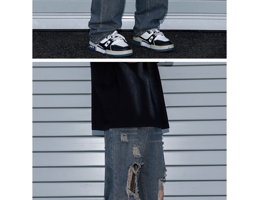 Trimecca - Hoge taille jeans met wijde pijpen en versleten look