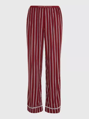 Calças de pijama com listras e logotipo em tom sobre tom