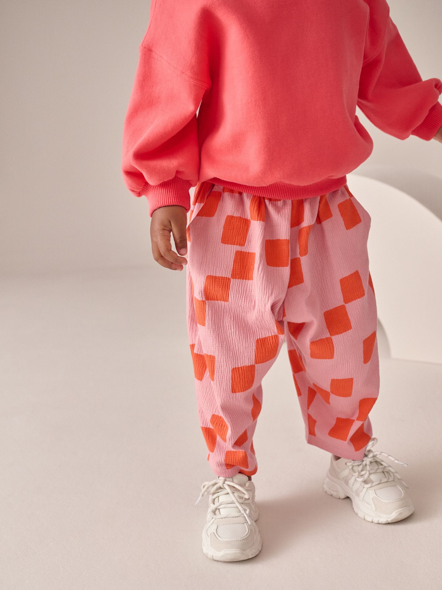 Roze met dambordmotief - Barrel Trousers (3mths-7yrs)