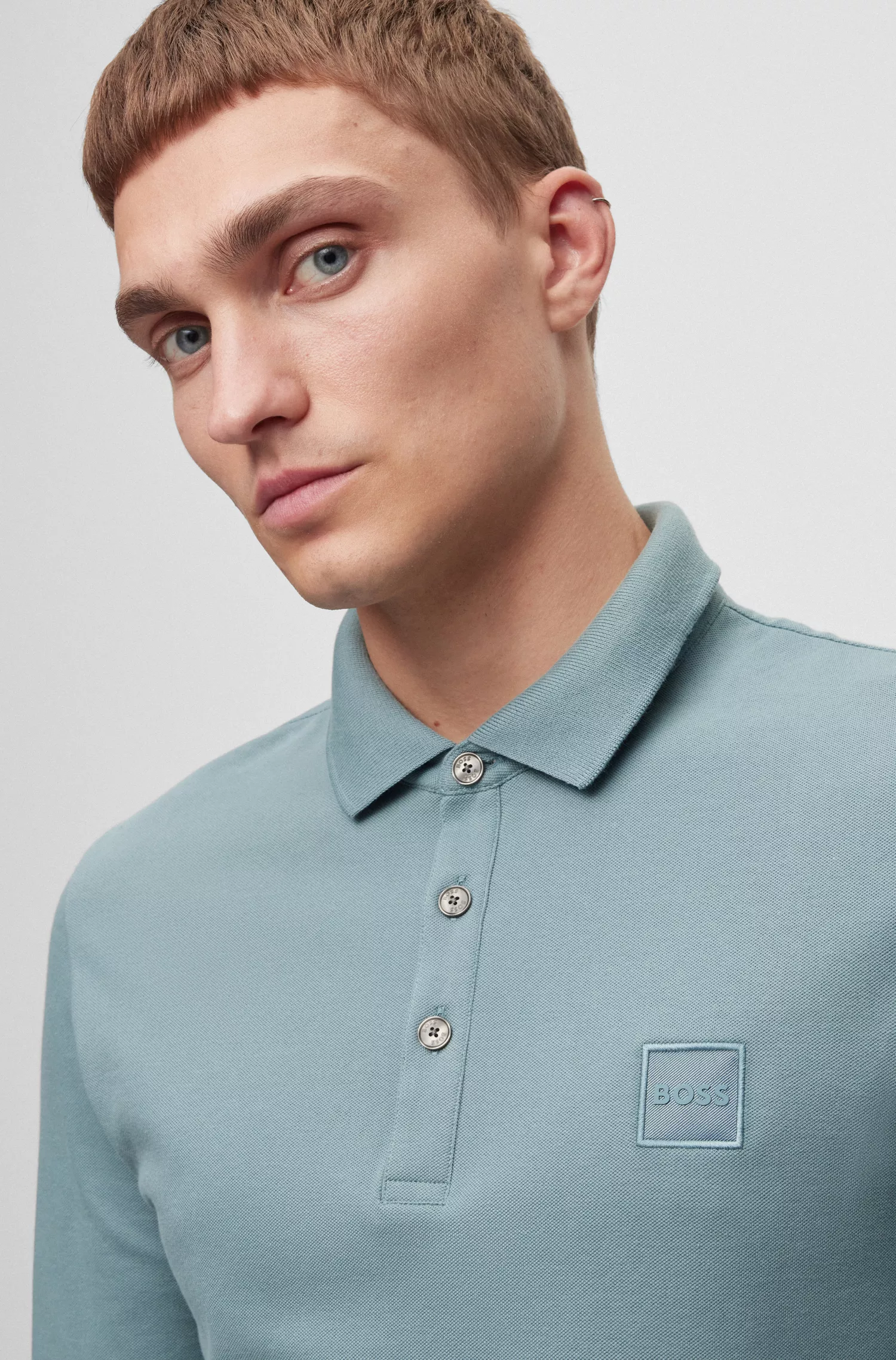 Camisa polo BOSS laranja de manga comprida e corte slim com etiqueta de logotipo.