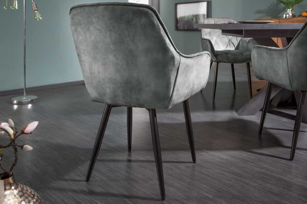 Design Stuhl MILANO grün Samt mit Armlehne Ziersteppung gepolstert schwarze Metallbeine