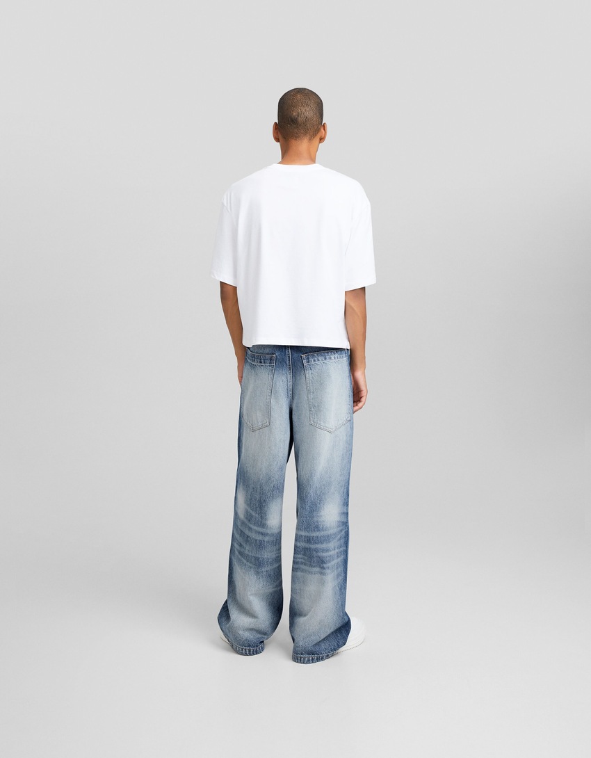 calças jeans super largas