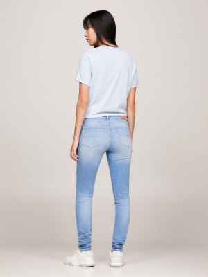 Calça jeans Nora de cintura média, skinny e desbotada.