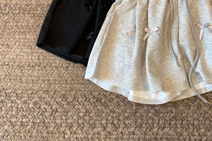 Closette - Zweetshorts met trekkoord in de taille en strik
