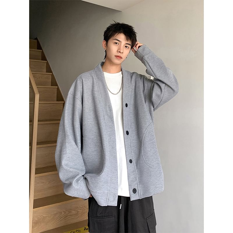 Adotuastic - V-hals effen oversized jasje met knopen