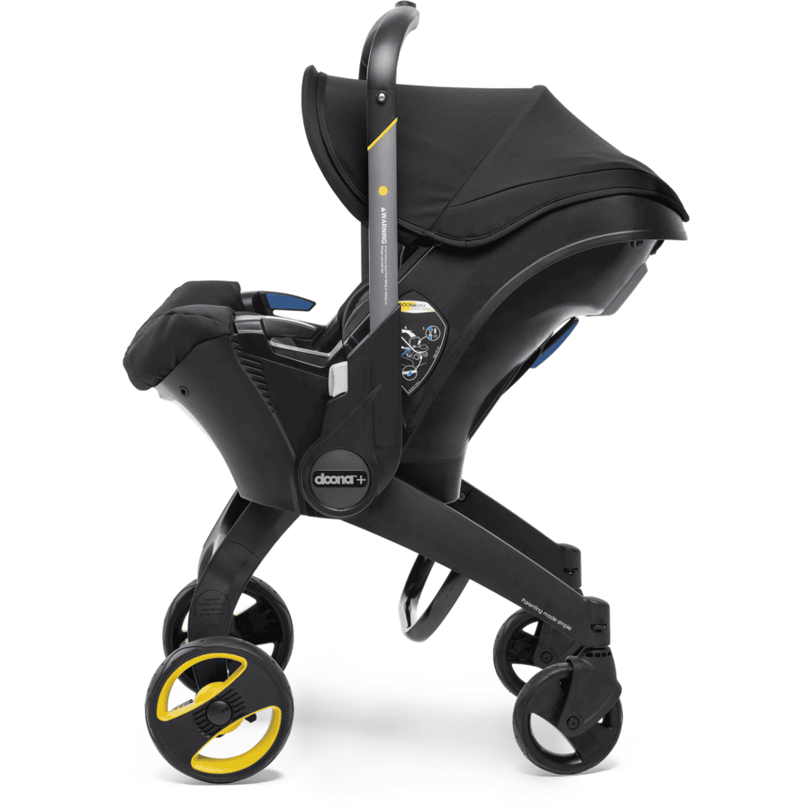 doona Babyschale Nitro Black  schwarz mit voll integriertem Fahrgestell, 2 in 1