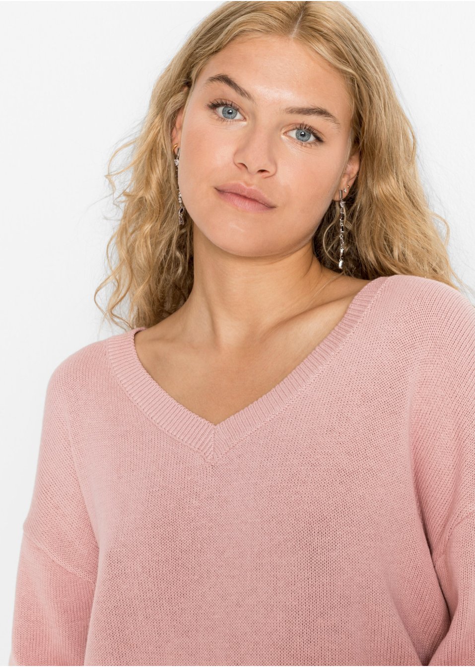 Pull à détail nœud et manches amples