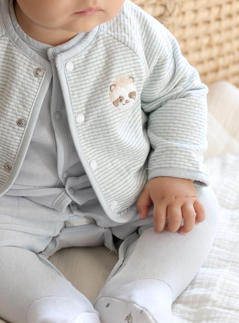 Ensemble grenouillère bleu ciel et gilet écru