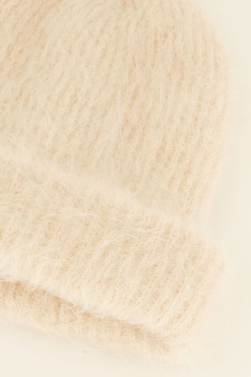 Beige hairy muts