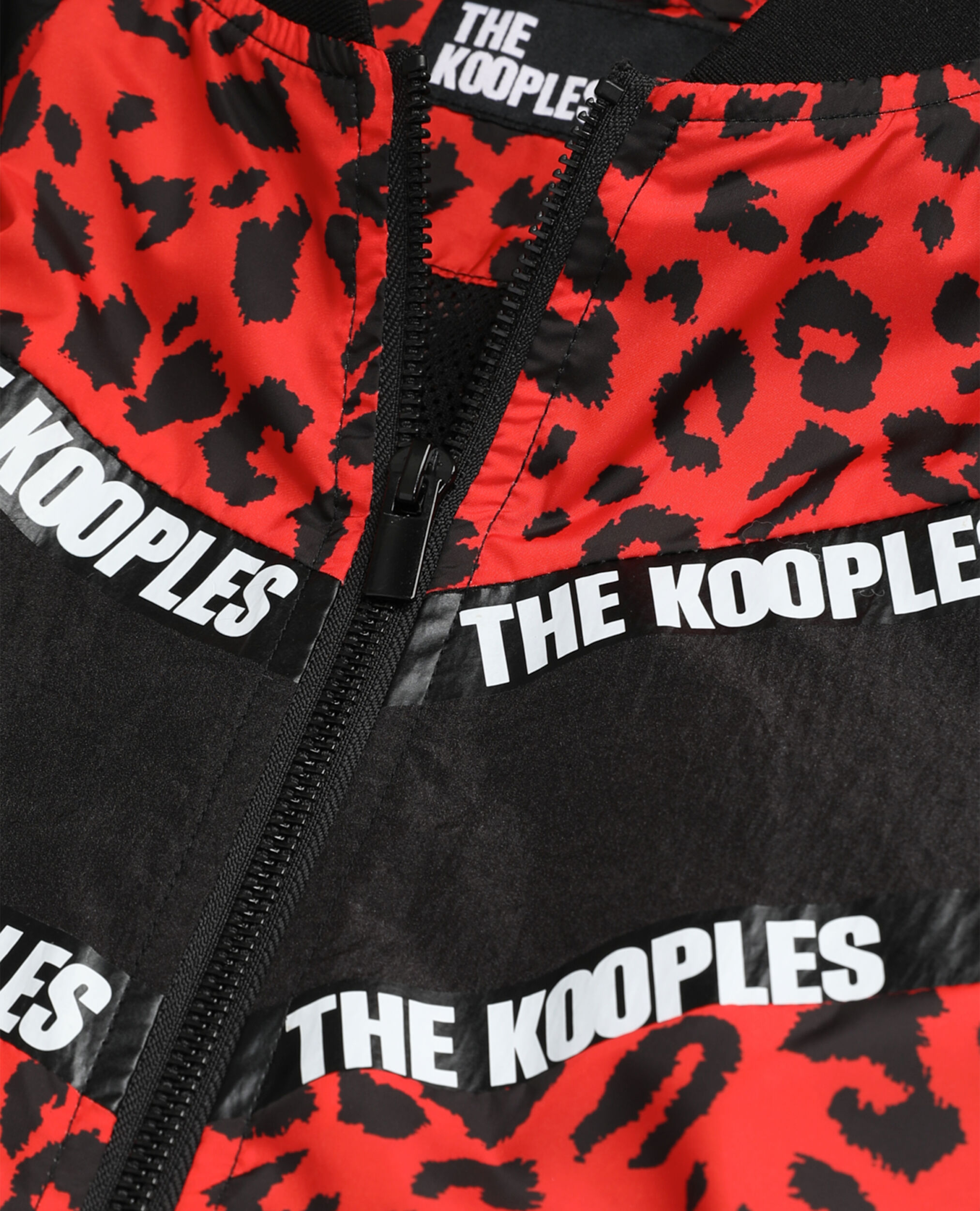 Blouson bicolore avec bandes logo