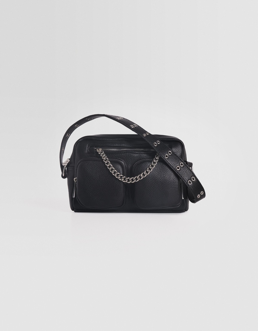 Bolsa transversal multifuncional com corrente e bolsos.