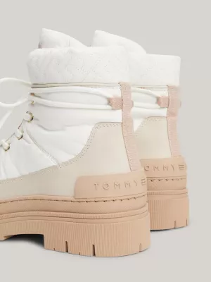 Botas de cano alto com cadarço e monograma TH