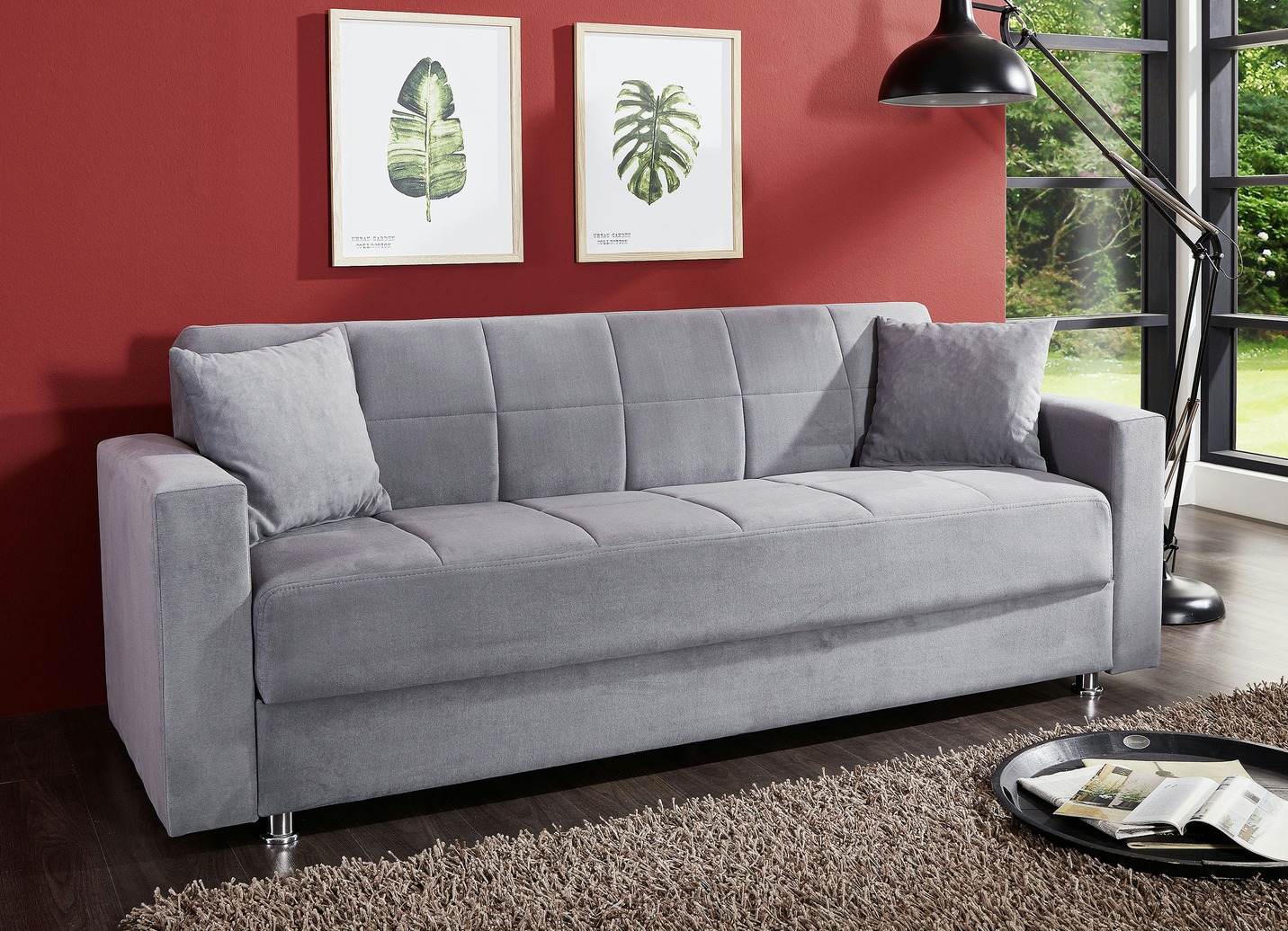 Klick-Klack-Sofa mit Dekokissen