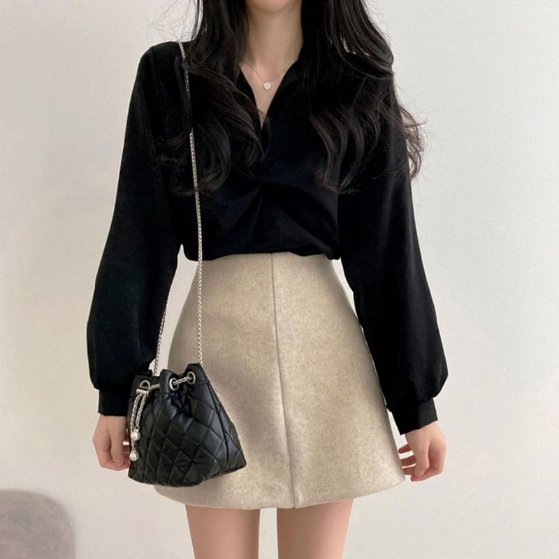 Trisica - Blouse met V-hals en gedraaide voorkant