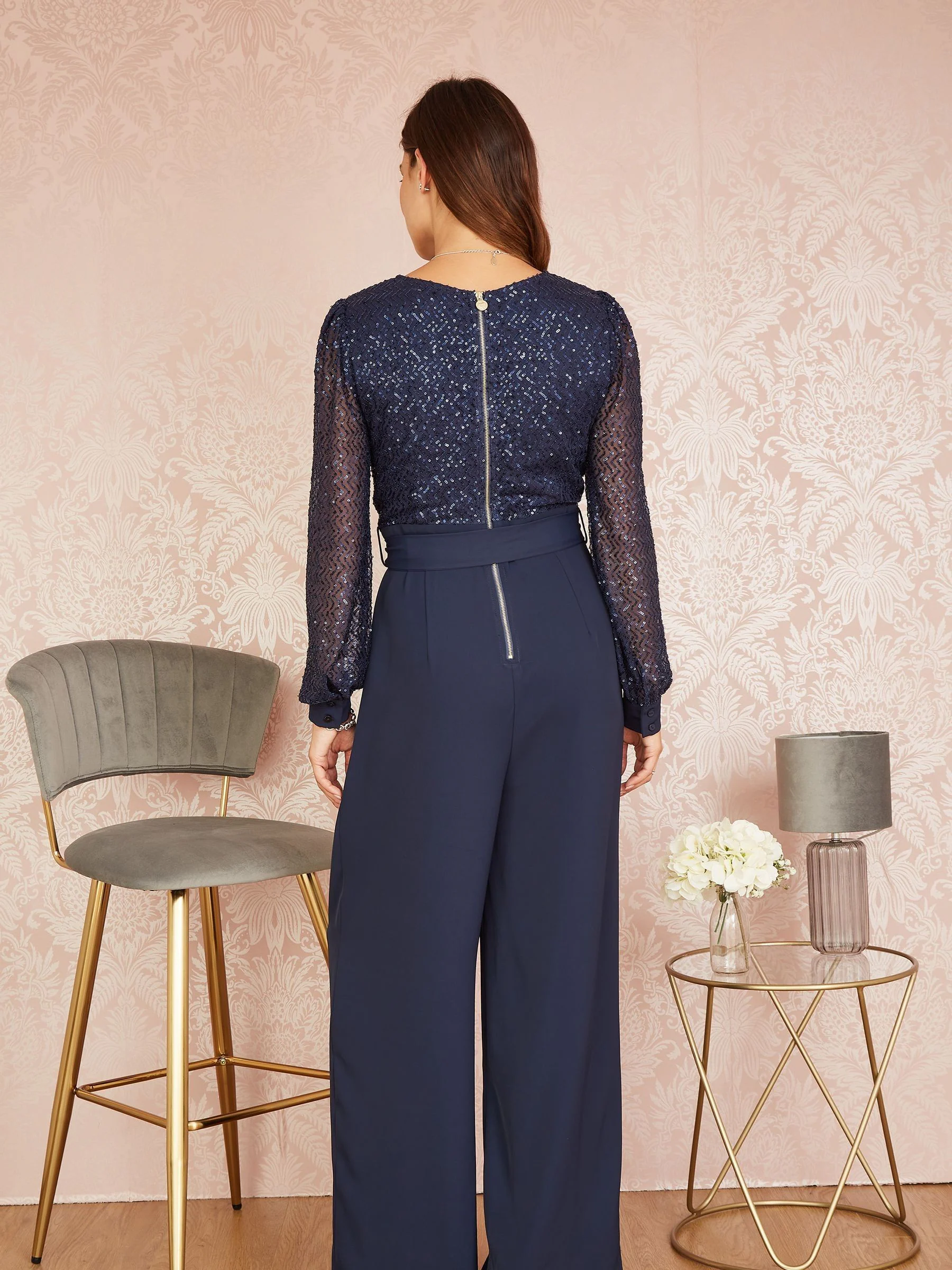 Yumi - Jumpsuit met lovertjes en lange mouwen