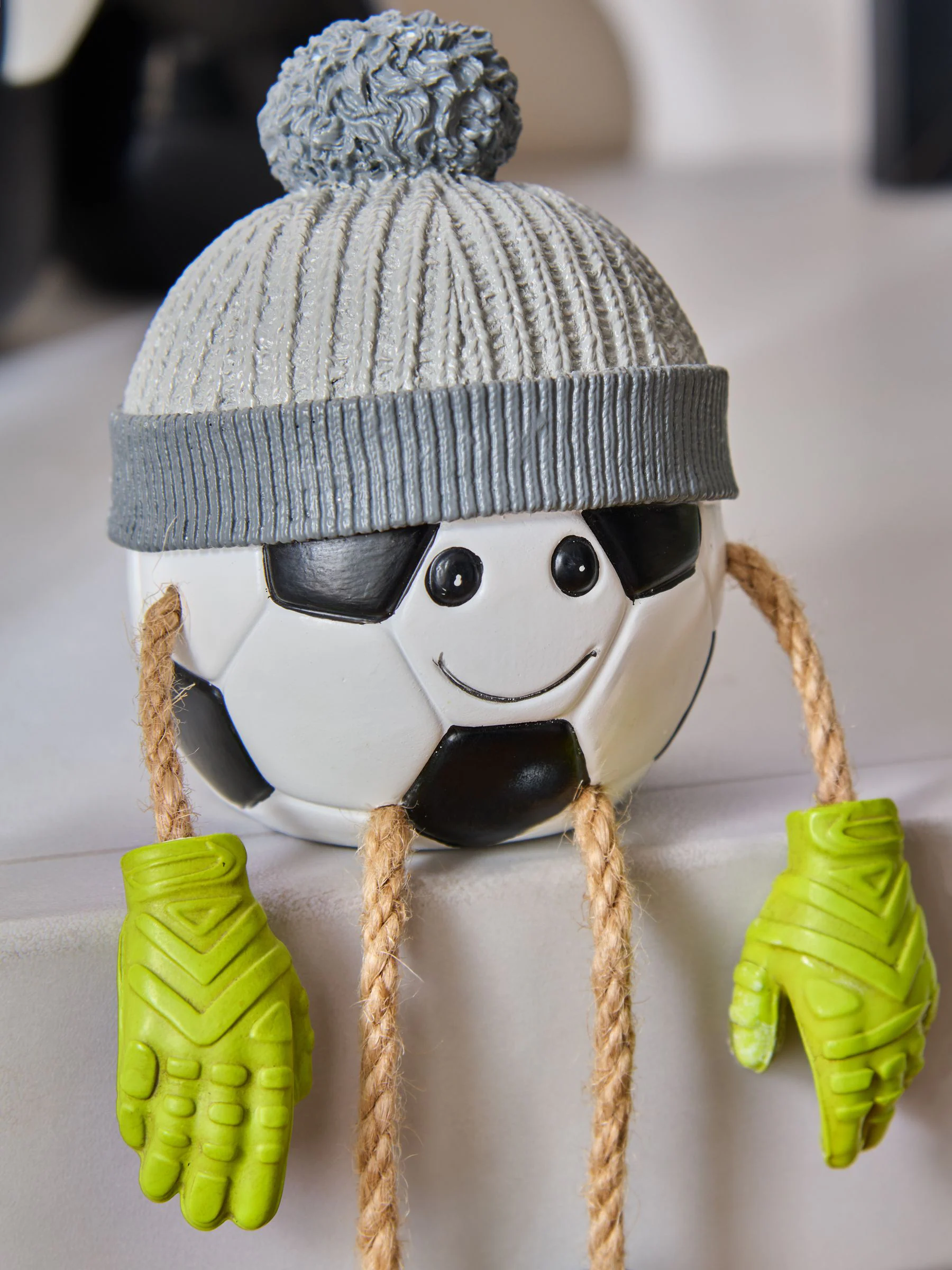 Decoratie met bungelende pootjes