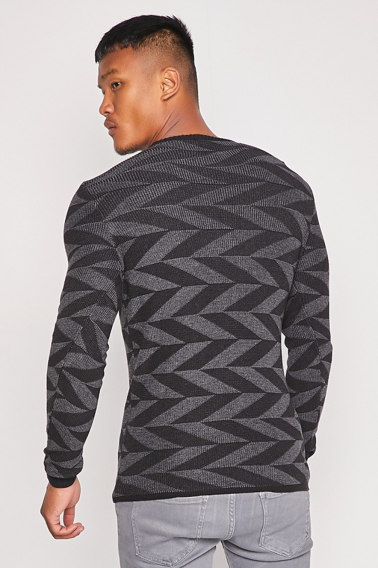 Pull noir/gris foncé avec imprimé géométrique