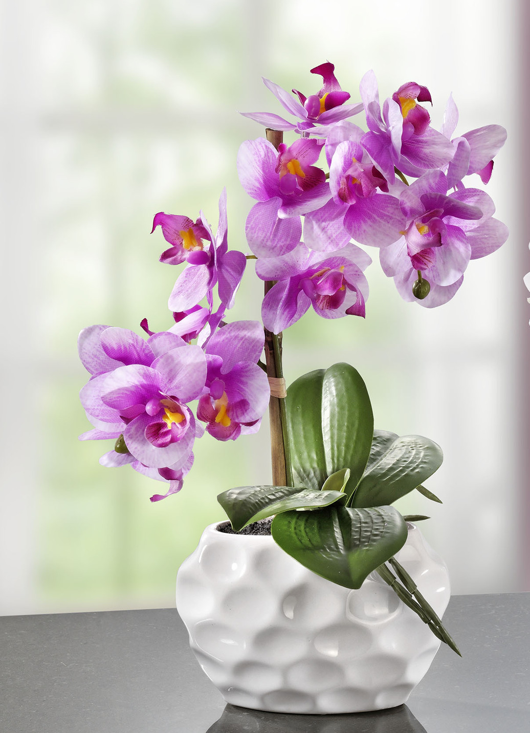 Orchideen-Gesteck in Keramikvase