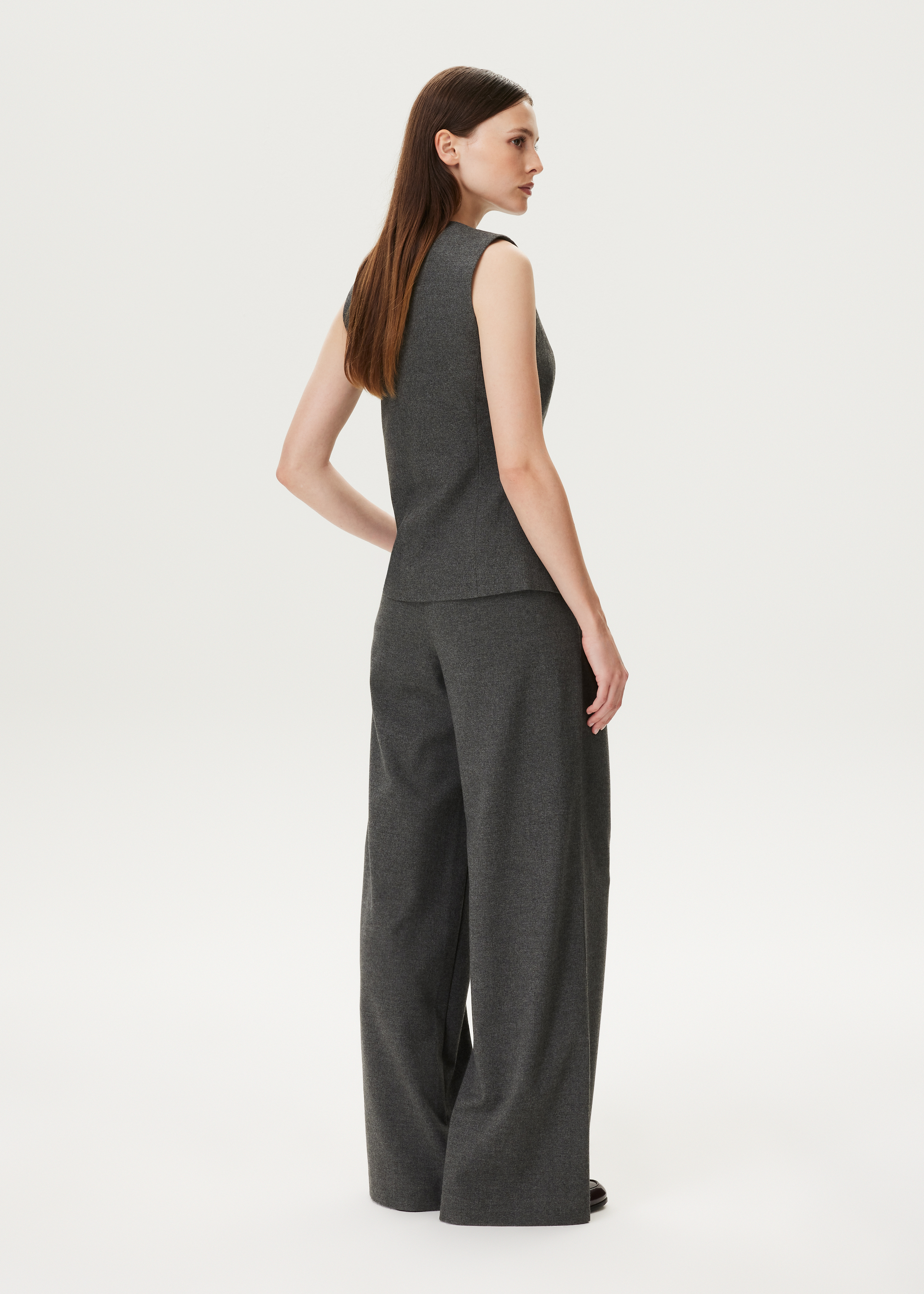 Melange gilet met sierknopen