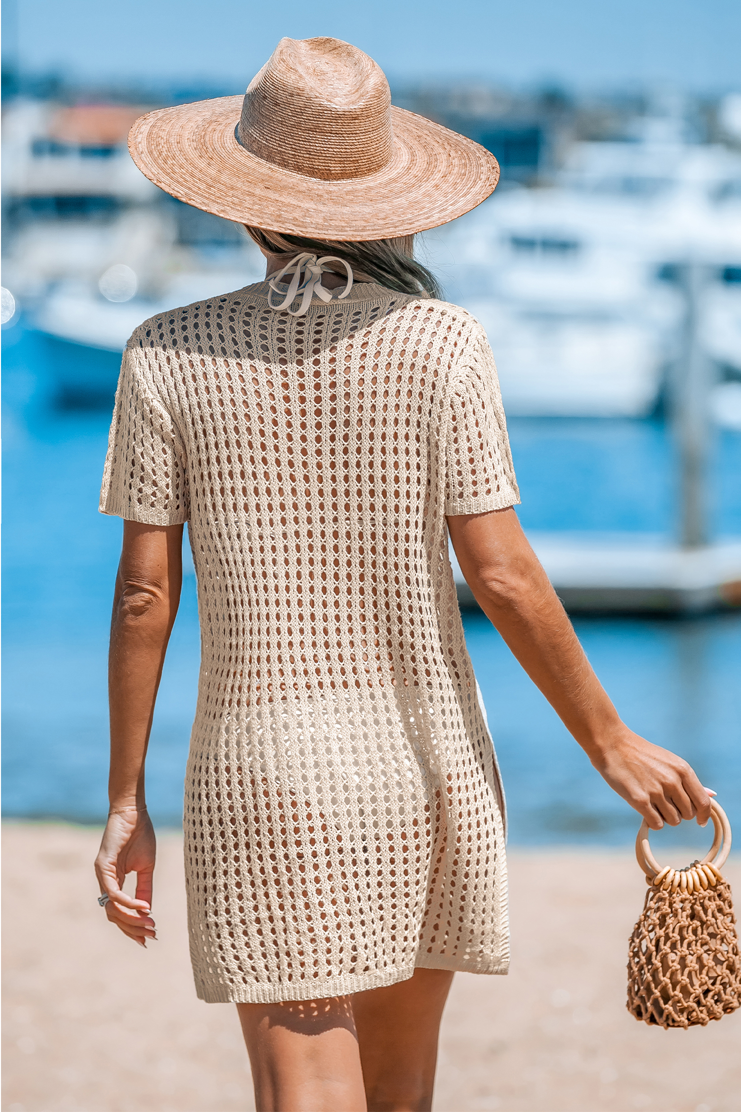 Haut cover up en tricot ouvert avec boutons sur le devant abricot