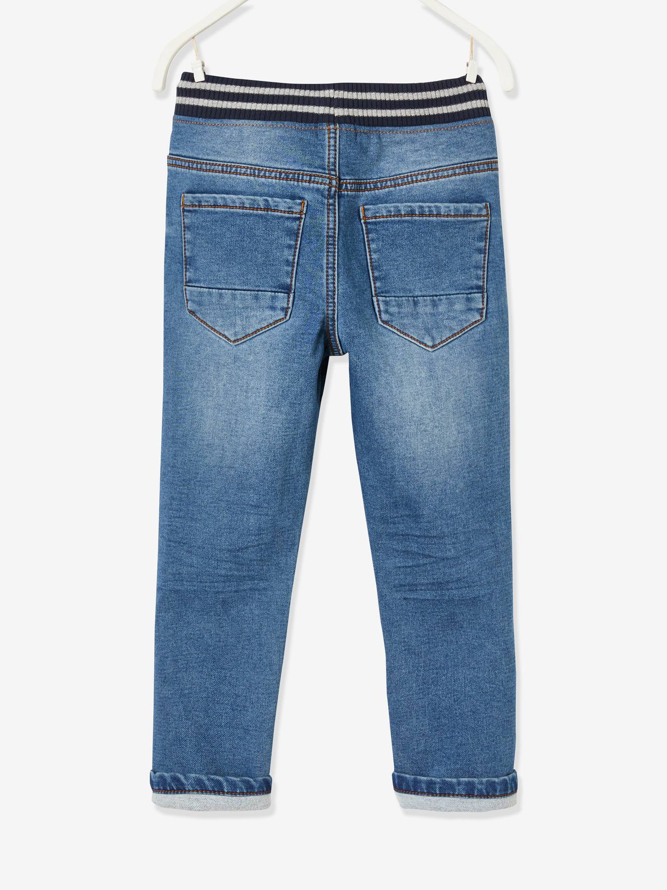 Calças de lã com efeito jeans e interior azul escuro e aconchegante.