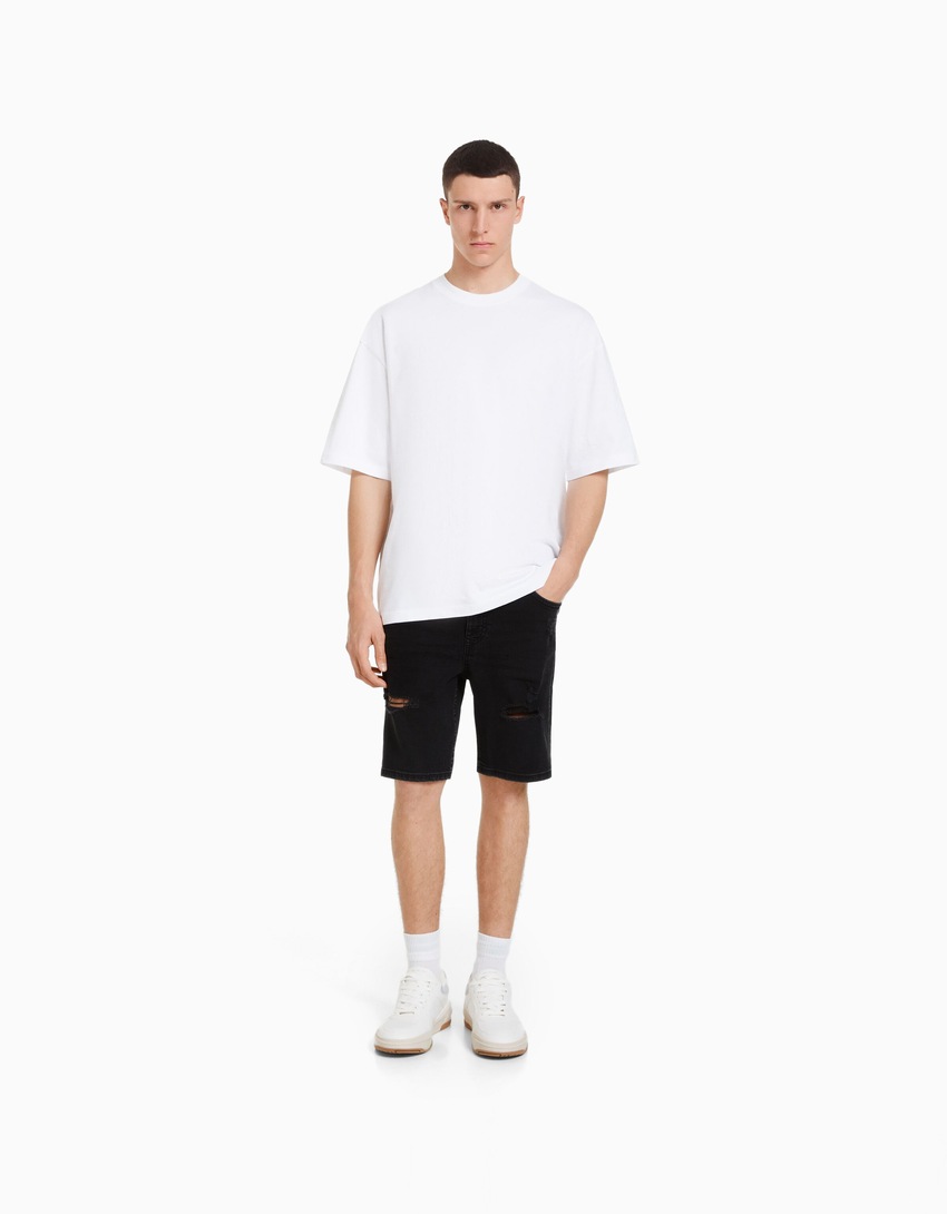 Bermuda jeans rasgada