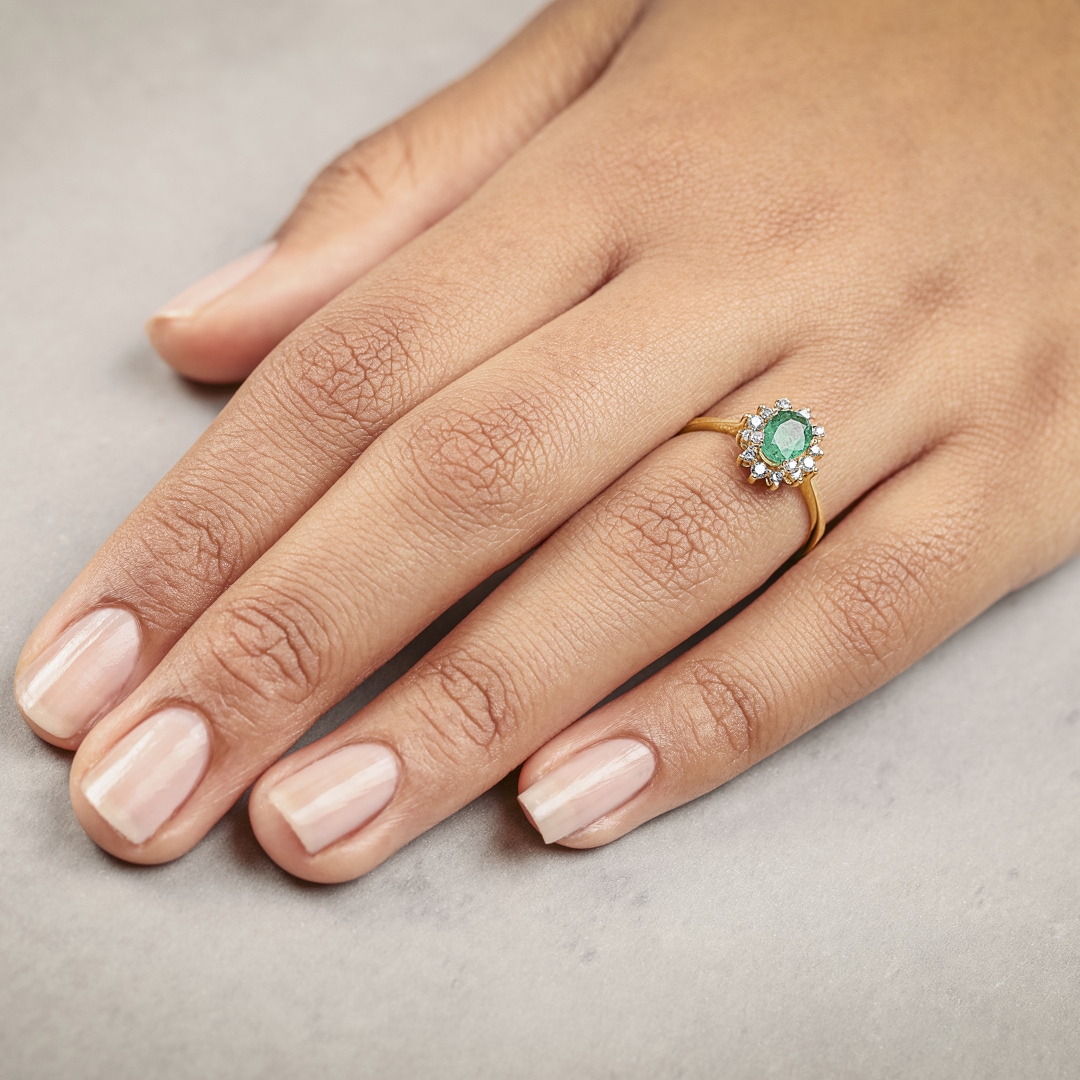 Damenring 750/18 K Gelbgold mit Diamanten 0.22 ct H/si & Smaragd 0.62 ct