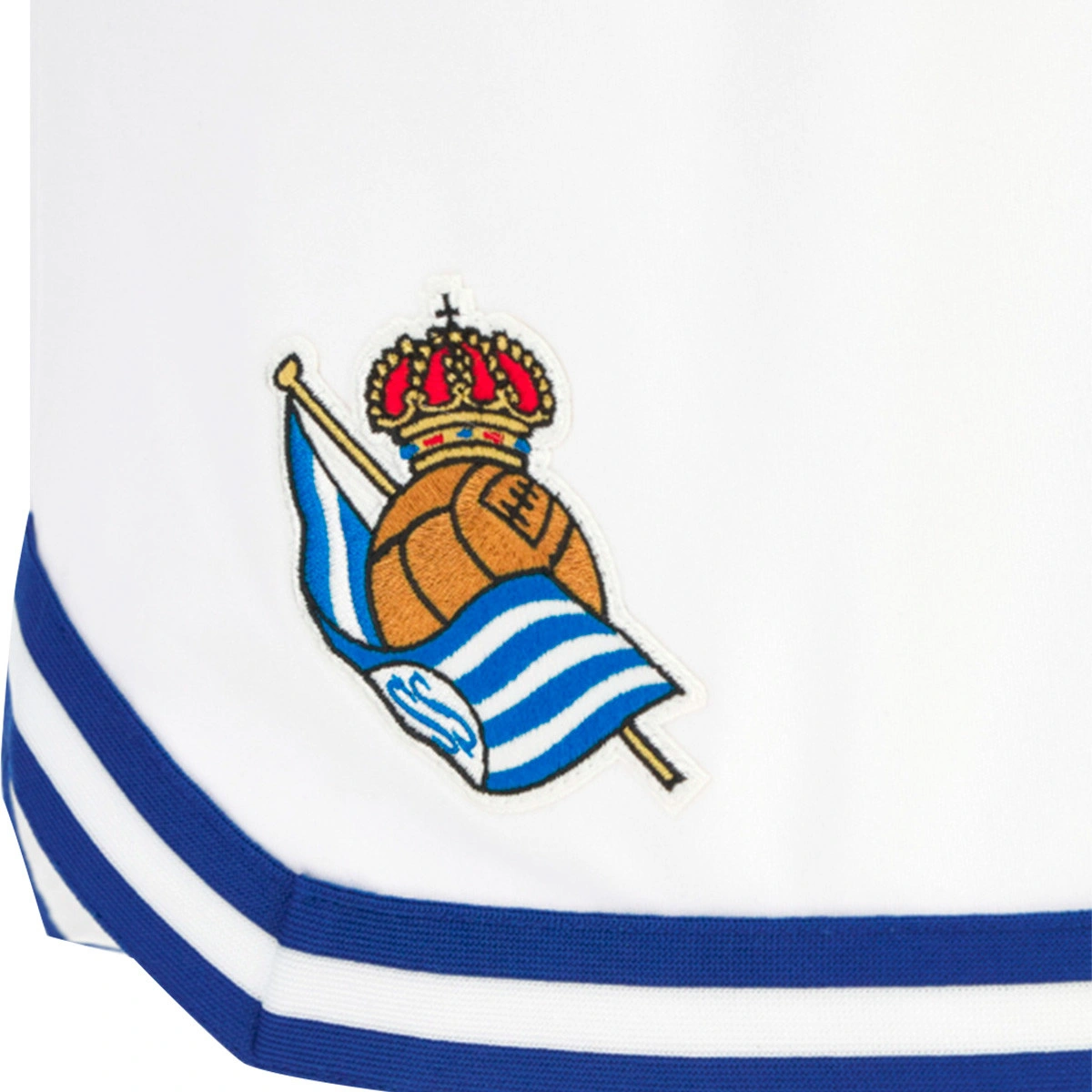 Calções Macron Real Sociedad Primeiro Equipamento 2025-2026 Criança
