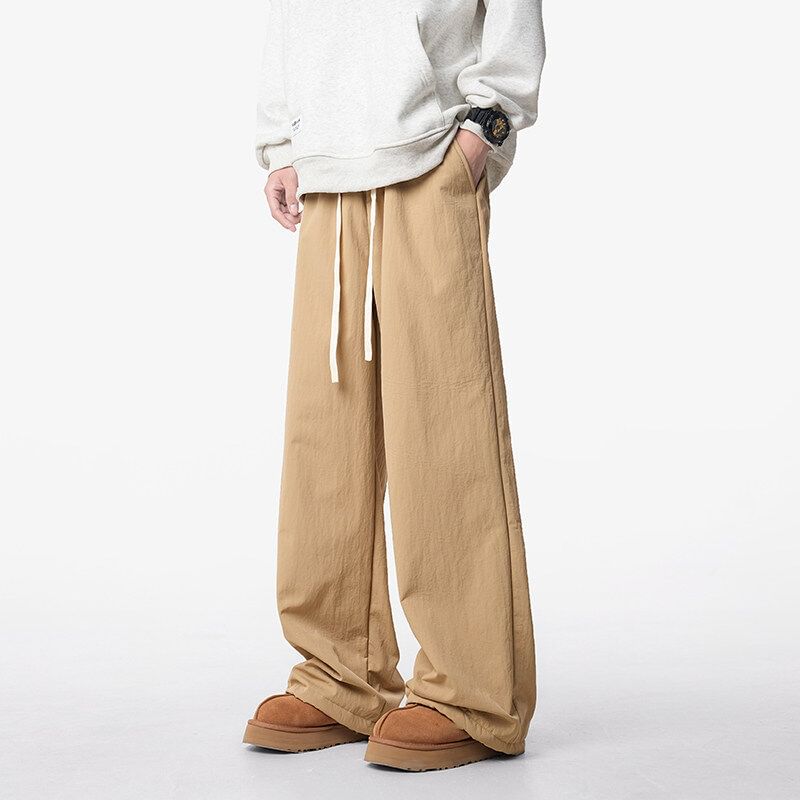 Kimeya - Effen broek met wijde pijpen en trekkoord in de taille