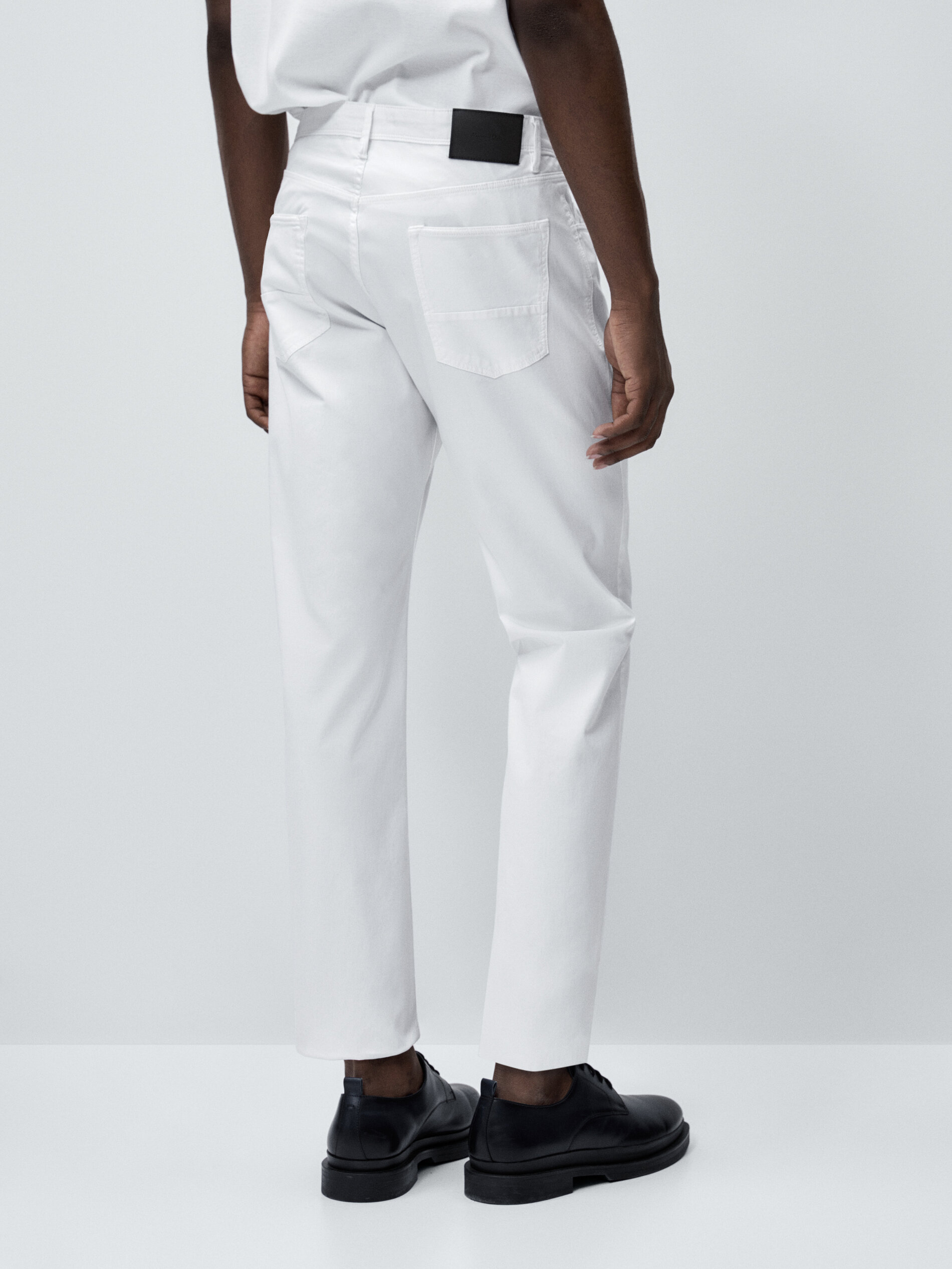 Calça tejanera de malha slim fit - BRANCA