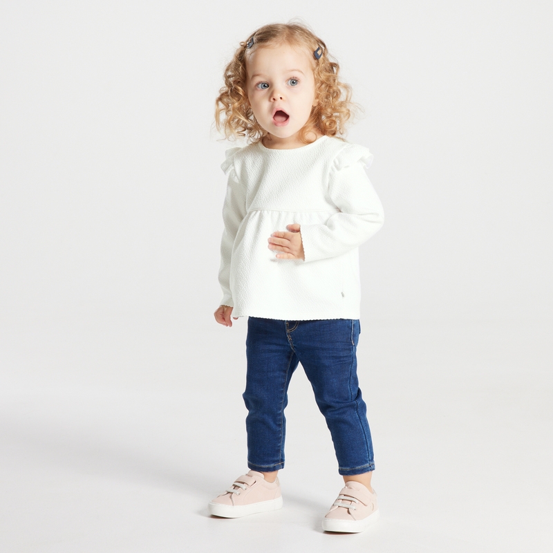 Blouse unie tissu gaufré à volants blanche bébé fille