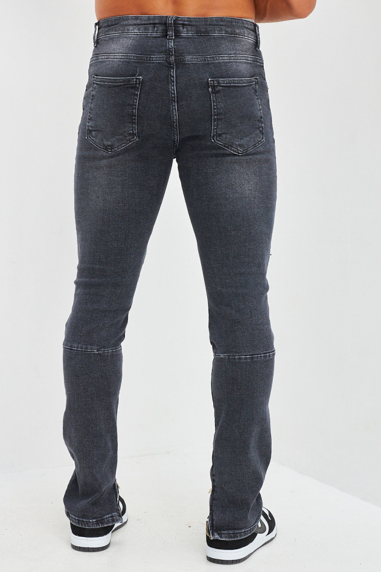 Jean effet déchiré aux genoux noir délavé