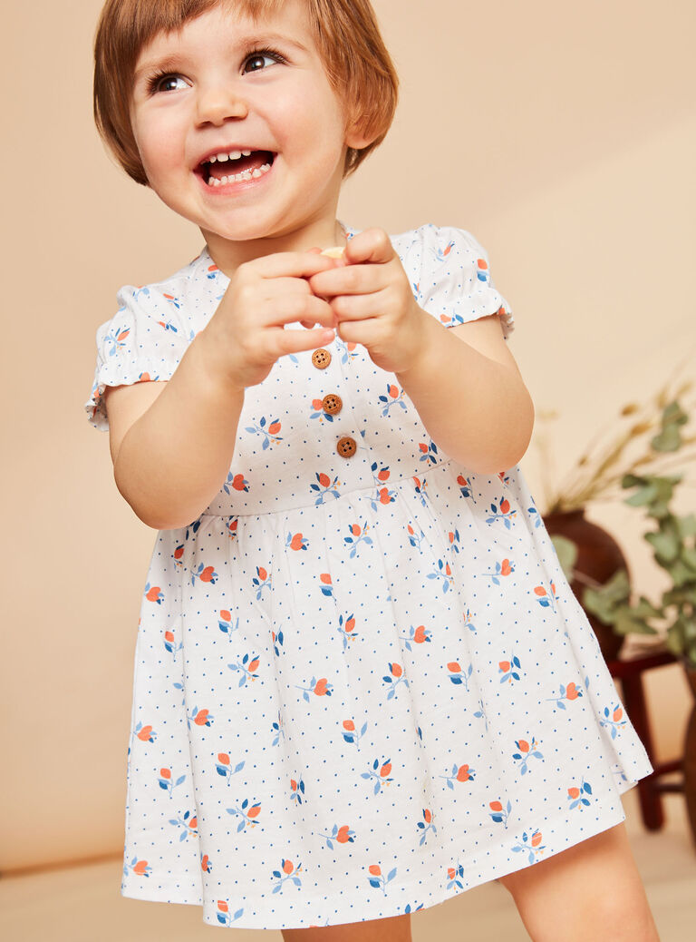 Robe écrue avec body intégré à imprimé fleuri