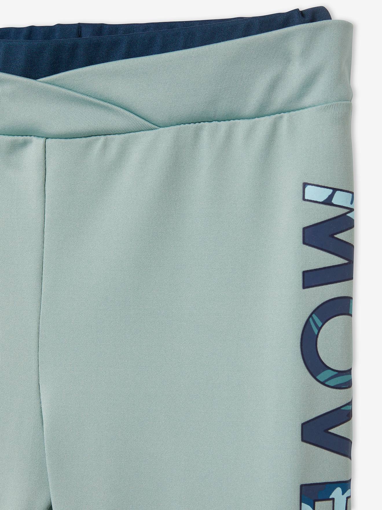 Conjunto de moletom cinza mesclado tamanho médio para meninas, composto por blusa com amarração e leggings.